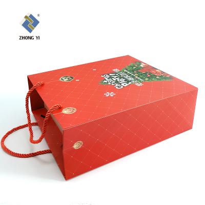 China Recyclable Recycled Cardboard Luxury Paper Custom Gift Bag With Handle For Shopping Bag With Your Own Logo for sale