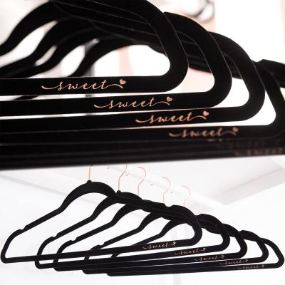 China 0.6cm CLASSIC Logo Advertising Word Black Velvet Hangers Custom Clothing Hanger Velvet for sale