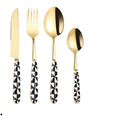 China Viable Factory Wholesale Portable Ceramic Reusable Handle Stainless Steel Cutlery Set for sale