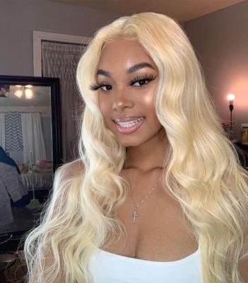 China 100% Body Wave 613 HD Lace Front Wig Virgin Brazilian Blonde Silky Straight Human Hair Lace Front Wig For Black Woman for sale