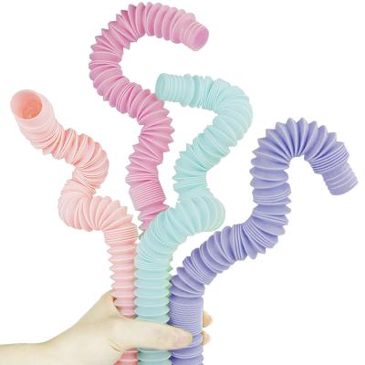 China Creative Magical Toy Gift Colorful Circle Funny Toys Stress Relief Plastic Sensory Toys Decompression Hose Stretch Bending Noise Plastic Tube Coil Children's Early Development Educational for sale