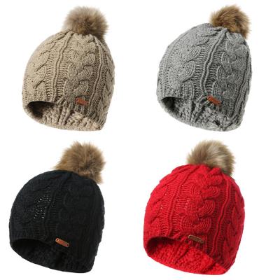 China JOINT Twist Simulation Knitted Pom Pom Hat Soft And Warm Winter Hats Knit Beanie for sale