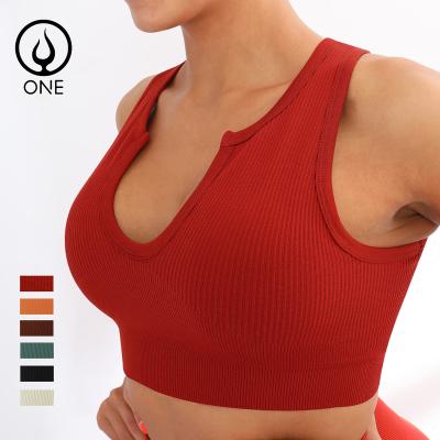 China Sleeveless Breathable Ribbed V-Neck Workout Crop Tops Removable Padded Sports Bras Yoga Sexy Tank Tops In Solid Colors for sale