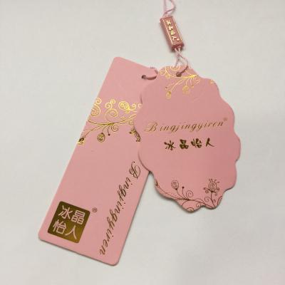 China Recyled Made In China Custom Swing Hang Tags New Designs Clothing Garment Pant Logo Tag Garment Label for sale