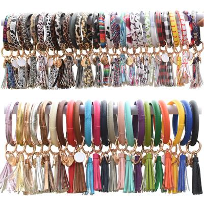 China Pu+plastic+metal 90 colors Tassels Key Chains Bracelets Bangles Bracelet Gift Key Ring Key Chain For Women for sale