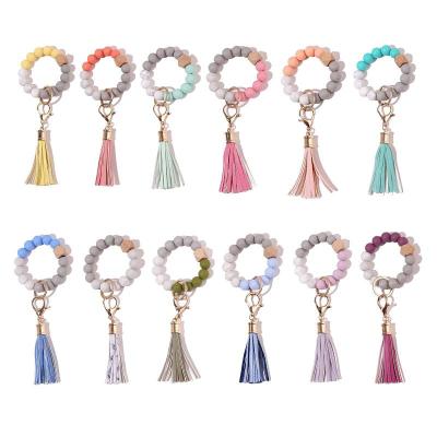 China Food Grade Silicone Beads Women Gift Silicone Beaded Bracelet Key Chain With Key Ring Tassel Bracelet Bangle for sale