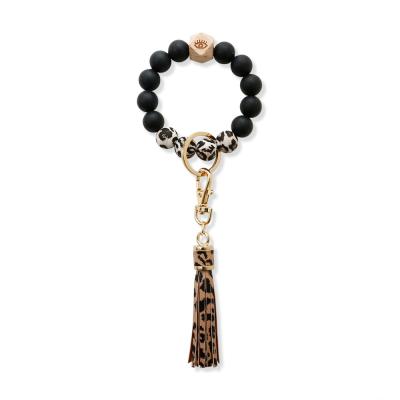 China Food grade amazon leopard print silicone rubber beads wrist key chain braceletPUCreative female main key chain for sale