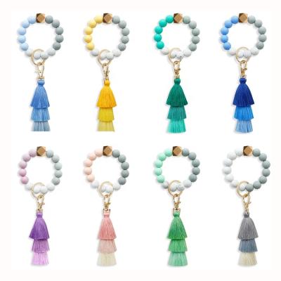 China Edible Silicon Rubber Beads Female Creative Hand Ring Bangle Bracelet Keychain Amazon Cotton Tassel Key Chain Bracelet for sale