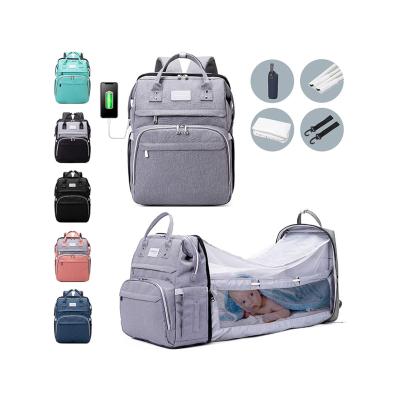 China Water Proof 7-in-1 Mom Diaper Bag Diaper Bag Backpack With Station Large Capacity Waterproof Changing Bag With Foldable Crib Maternity for sale