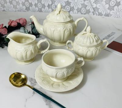 China Viable European Vintage Berry Leaf Flower Bouquet Milk Pot Sugar Pot Coffee Cup Saucer Cream Ceramic Embossed Ceramic Tea Set for sale