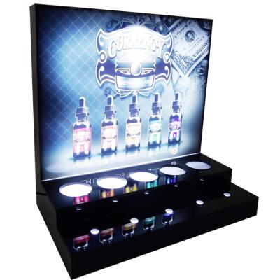 China Bottle Holder Smoke Shop CBD Vape Pods Display,E Cig Oil Atomizer Display Cabinet Acrylic Electronic Cigarette Tobacco Display Stand for sale