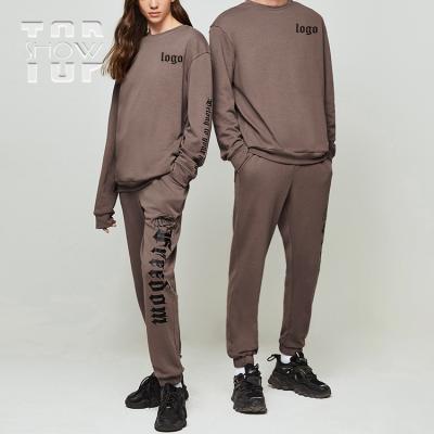 China Breathable Neutral Style Floral Letter Print Loose Minimalist Sweater And Pants Set Drawstring Cotton Sweatsuit Unisex Tracksuit for sale