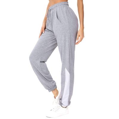 China custom Anti-wrinkle waist drawstring jogger top tapered color block women sweatpants with pocket for sale