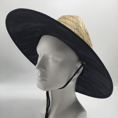 China Custom Character Summer Rushing Fancy Grass Woven Fisherman Natural Hollow Straw Hat for sale