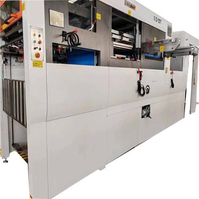 China machinery & Feida Material Automatic Feeding Paper Cutting And Creasing Machine With Four Side Stripping for sale