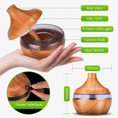 China Household Air Mini Aromatherapy Diffuser Aroma Oil Diffuser Led Home Wooden Electric Humidifier Diffuser for sale