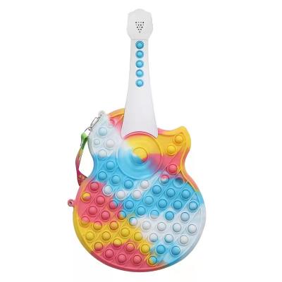 China Hot Selling New Fashion Silicone Push Bubble Stress Reliever Silicone Toddler Sensory Cross - Body Guitar Shoulder Bag Toddler Toys for sale