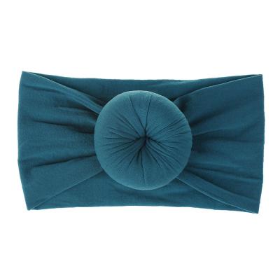 China Newborn Baby Hair Accessories Fashion Headwear 23 Colors Popular Wholesale Nylon Headband Donuts Elastic Baby Hair Band Solid Color Turban for sale