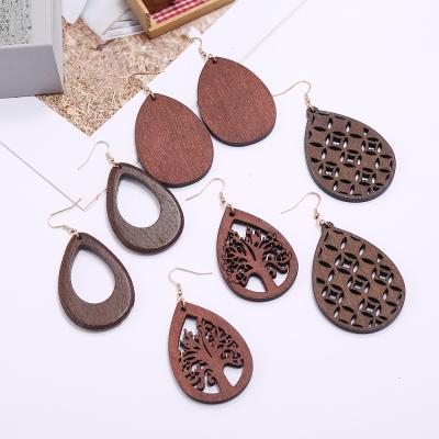 China Fashion HOT Jewelry TRENDDY Creativity Soft Amazon Earrings Wood Hollowed Out Water Drop Earrings for sale