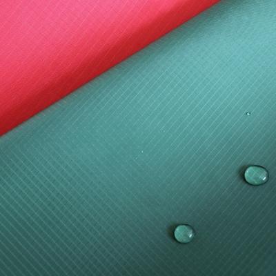 China Waterproof 210D Polyester Ripstop Oxford Fabric Coated Ripstop 100% Polyester Spandex Fabric for sale