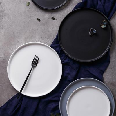 China Sustainable Hot Selling Minimalist Sustainable Dishes Black Ceramic Large Round Dishes 10 Inch 8 Inch for sale