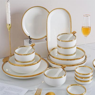 China Sustainable Brand New Restaurant Home Design Luxury European Gold Rim Porcelain Dinnerware Set for sale