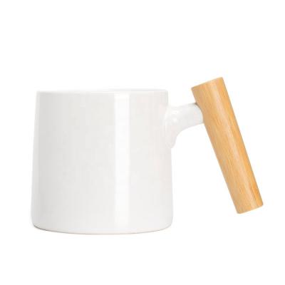 China DHPO Sustainable Ceramic Coffee Mug Porcelain Mug With Unique Bamboo Handle for sale