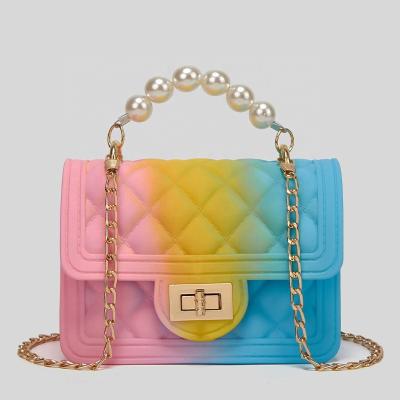 China Hot Selling Kids Jelly Purse Jelly Bag Pvc Mini Rainbow Handbags Women Summer Wholesale Motion Sensing Small for sale