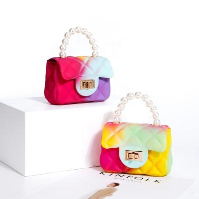 China Portable Kids Mini Handbags Rainbow Purses Chain Jelly Bag Women Little Girl Bags Kids Candy Cross - Body Purses Bead Handle Purse for sale