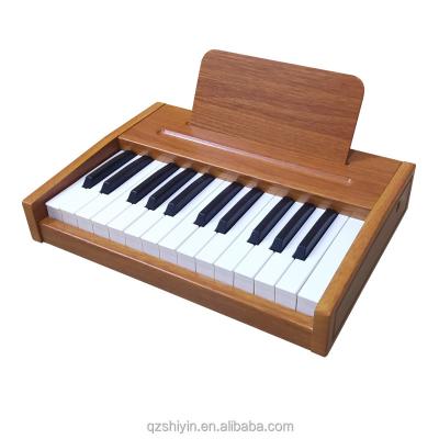 China Toy Mini Child Wooden Toy Musical Piano Toy Baby Wooden Piano for sale