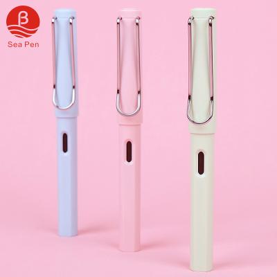 China Candy macaroon color good quality popular even plastic trackball pen with custom logo for sale