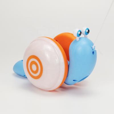 China Eductional Preschool Toys New Cartoon Rope Animal Baby Crawling Musical Hindrance Toddlers Musical Line Pull Snail Toy With Light for sale