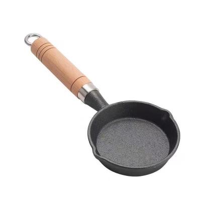 China Creative Artifact Omelet Oil Household Mini Cast Iron Pot Small Pan Easy To Clean Kitchen Stocked Iron Pan for sale