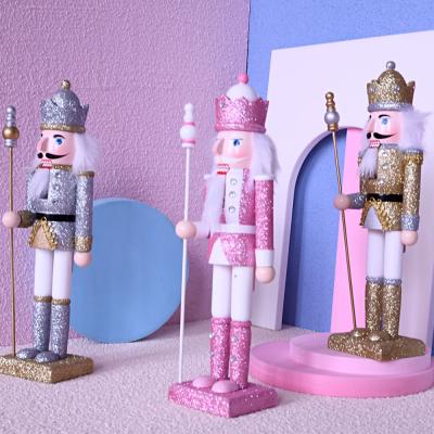 China Christmas Ornament Opens Dropshipping Decoration Supply Crafts Cartoon Christmas Decorations Gift 30CM Wooden European Clever Nutcracker Pink King for sale