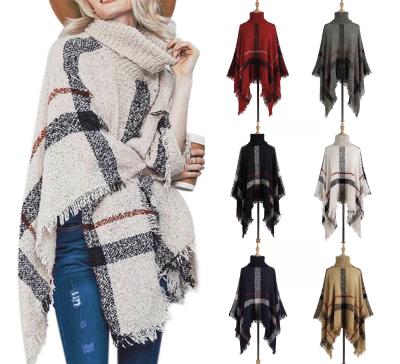 China Winter Cozy Sweater R83 Plaid Tassels Shawl Knitting Cloak Female Pullover Ponchos And Capes for sale