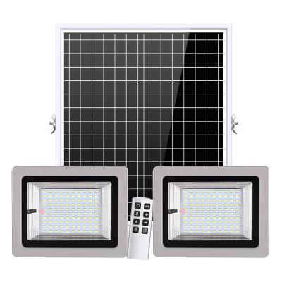 China Waterproof Solar Garden Guangdong LED Floodlight 200w Solar Powered Double Heads Outdoor Solar Flood Light for sale