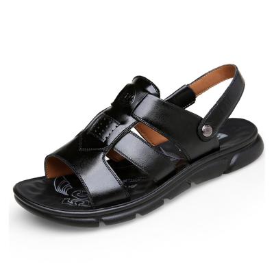 China Flat Solid Color Cut Toe Flat Rivet Summer Outdoor Beach Genuine Leather Open Sandals For Men for sale