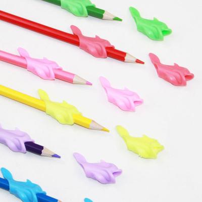 China Fish Baby Kids Students Environmental Stationery Pencil Participation Practice Device To Correct Pen Holder Postures Grip for sale