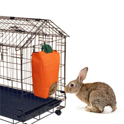 China Custom Sustainable Carrot Oxford Manufacturer Designer Hanging Rabbit Grass Storage Pouch Small Animal Hay Bag Container for sale