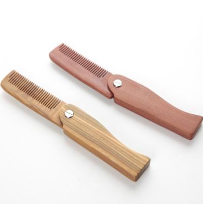 China Comfortable Professional Pocket Sandalwood Comb Men's Wooden Folding Beard Comb for sale