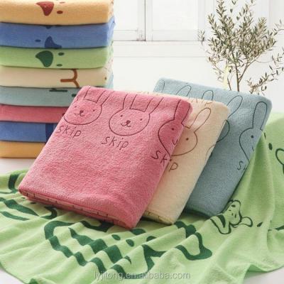 China Compressed Cartoon Design Print Super Soft Quick Dry Simple Bath Towel for sale