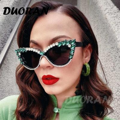 China Fashion Sunglasses Trend Oversized Rhinestone Diamond Cat Eye Sunglasses Women Men Brand Luxury Designer Sun Glasses for sale