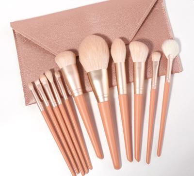 China New Arrival Wooden Handle Makeup Set Brush Mixed Coral Orange Color 11 Pieces With Pink Envelope Packing Bag for sale