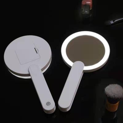 China Handheld and Portable Dimmable Small Square Mirror Portable Minimalist Mini Rechargeable LED Light Custom Colors and Shine for sale