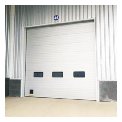 China Modern Remote Control Automatic PU Foam Insulated Sectional Industrial Door for sale