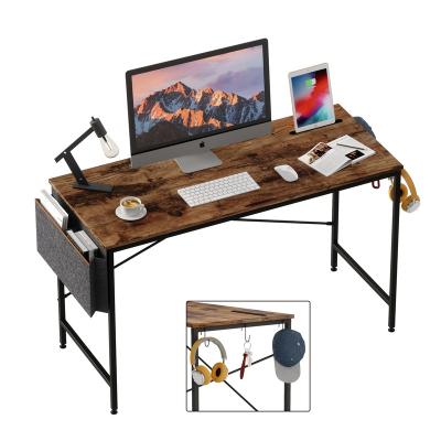 China Modern Simple Style Convertible 47 Inch Office Study Desk Laptop Table With Storage Bag Mail Packing Cheap Furniture for sale