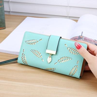 China Female wallets new leaf clip dollar price credit card zipper long latch women wallet hollow soft clutch wallet invent card purse for sale