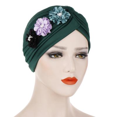 China Wholesale 2021 new design new design character ladies turban hat fashion muslim flower elastic women head nigerian turban for sale