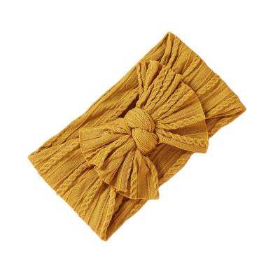 China Natural and fresh baby hair accessories color polyamide fabric comfortable wide bow baby hair band manufacturers. for sale