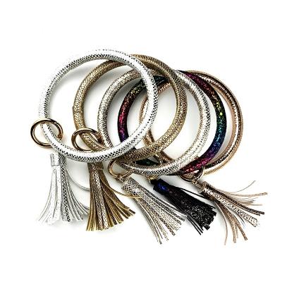 China High quality natural and cool selling gifts unlocks keychain women big O key chain girl PU leather tassel bracelet. for sale